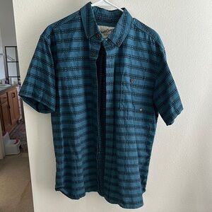 Men’s Duck Camp casual button down shirt.